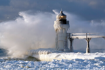 Large wave driven by  winter gale force winds sweeping over Lake Michigan of the Great Lakes...