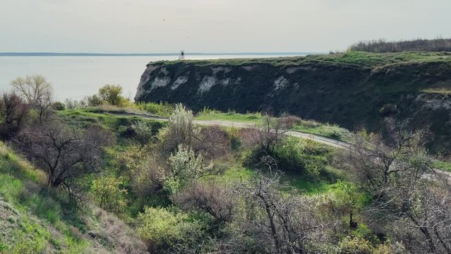 An abandoned dilapidated red brick oven. Saratov region, Russia. An ancient lime kiln on the banks of the Volga River. Stepan Razin's Rock. 4K