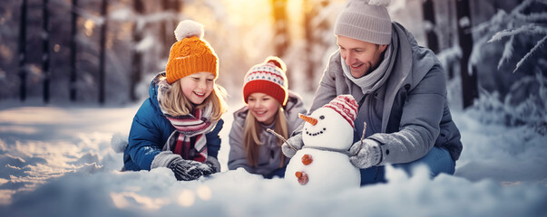 Family making a snowman in snowy forest. Concept of the relation and weekend together.