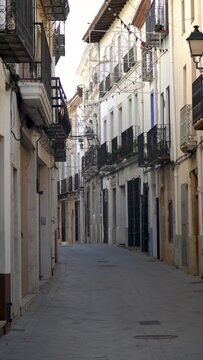 Slow motion, narrow street without people in Benissa, Alicante (Spain)