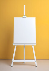easel with blank canvas in front of a sun yellow  wall
