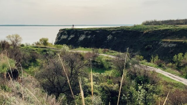 An abandoned dilapidated red brick oven. Saratov region, Russia. An ancient lime kiln on the banks of the Volga River. Stepan Razin's Rock. 4K