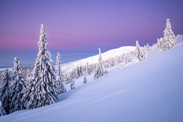 Snowy mountain sunset