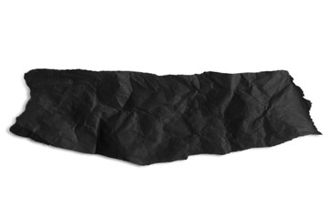 Scrap of crumpled black paper on empty background