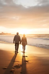 Kussenhoes old senior couple walking by sea beach at sunset, older romantic man and woman walk by ocean shore at summer sunrise © goami