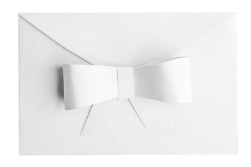 White envelope with bow on empty background