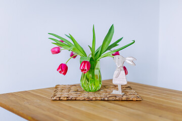 Easter decor and vase with tulips
