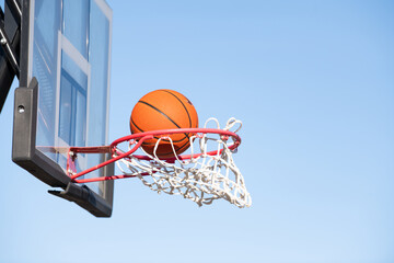 Basketball going through the net