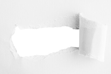 White thick paper, torn in the middle with an empty hole. And an empty background behind