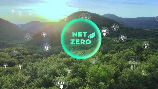 Aerial of Net zero environment sustainable concept with decreasing carbon CO2 icons in green eco-friendly landscape. Graphic animation