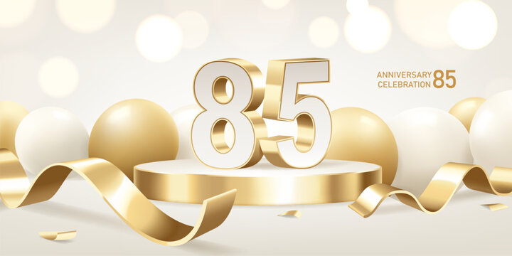 85th Anniversary celebration background. Golden 3D numbers on round podium with golden ribbons and balloons with bokeh lights in background.