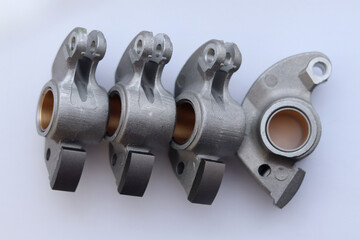 Light-alloy rocker arms with vanadium-chromed surfaces for contact with camshaft.