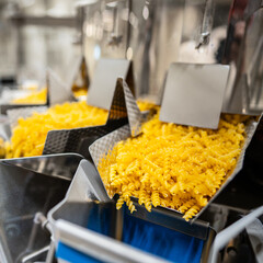 dispensing farfalle pasta at the factory - industry 5.0 in the food industry
