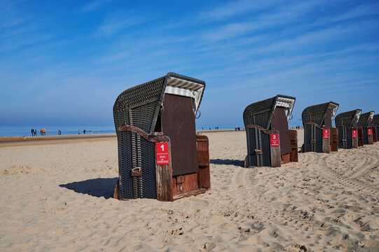 Egmond aan Zee, Netherlands - April 05, 2023: Beach chairs on the beach at Egmond aan Zee in the low season