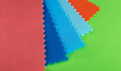 samples of multi-colored textured fabric on a bright background