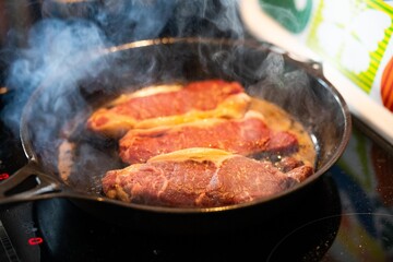 cooking wagyu steak in a pan at home in australia