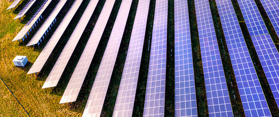 a modern solar park from above in the sun panorama