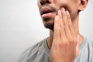 inflammation of the dental nerve, man with tooth ache, periodontal disease, wisdom teeth pain,...