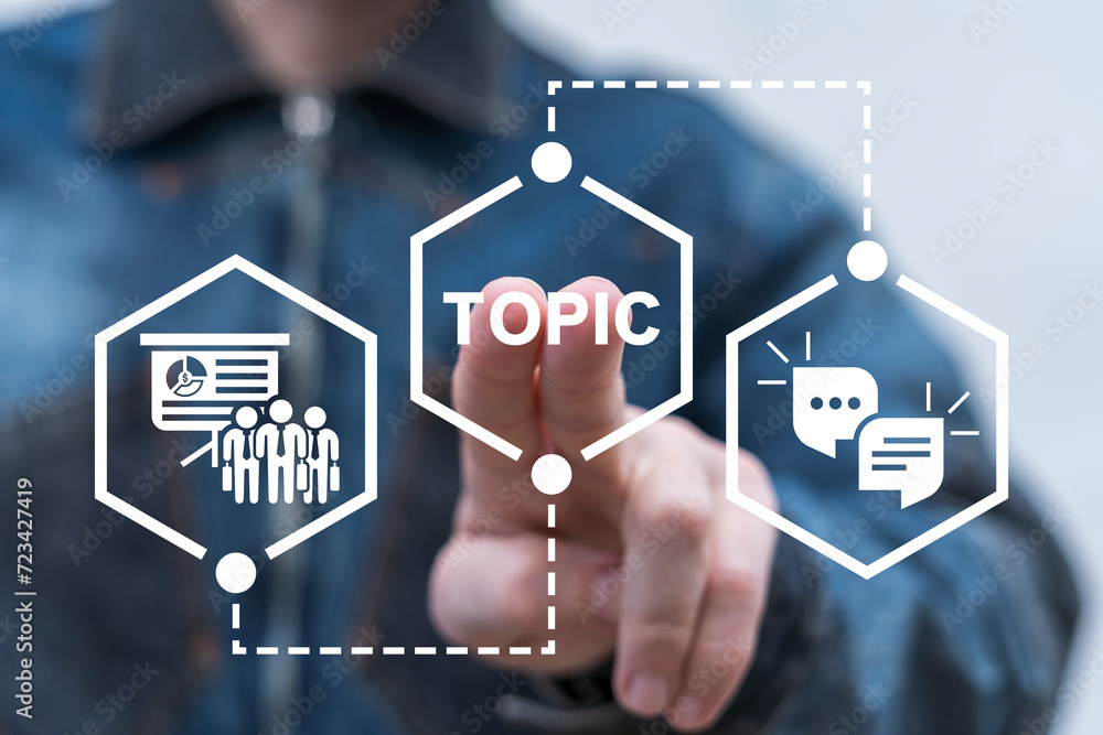 Poster man using virtual innovative touch interface presses word: topic. examine and study topic. trending 