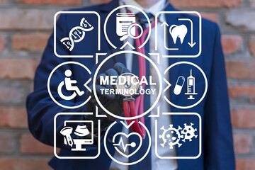 Doctor or medical trainee using virtual interface and stethoscope sees inscription: MEDICAL TERMINOLOGY. Health and Medical Education Science Concept - Medical Terminology. Medicine terms. - obrazy, fototapety, plakaty
