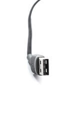 Black USB braided cable - Lightning isolated on a white background, close -up. (selective focus)
