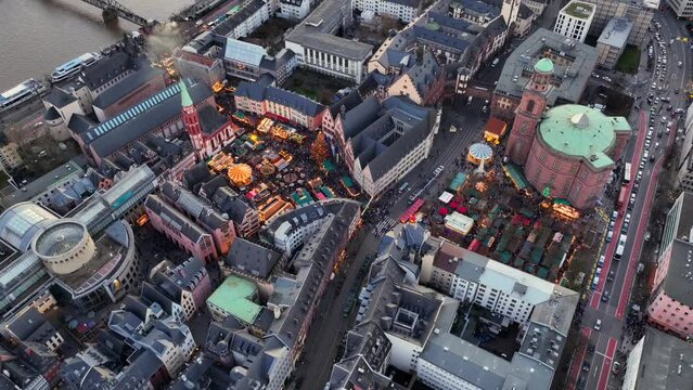 Frankfurt Christmas Market, Aerial Winter Drone Shot. Weihnachtsmarkt at Romerberg Square, Frankfurt am Main, Germany.