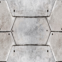 Seamless texture photo of rusty and worn armored vehicle plates surface.