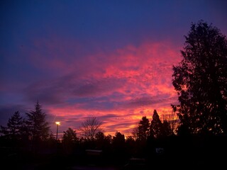 Amazing colorful sunrise over residential area of Saanich Peninsula, Vancouver Island, BC, Canada