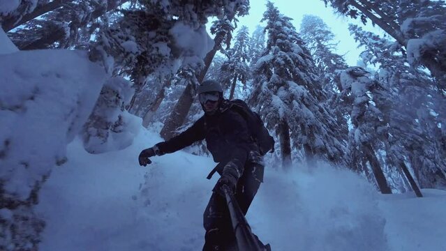 Extreme Snowboarding Tree Run Holding Action Camera Pole