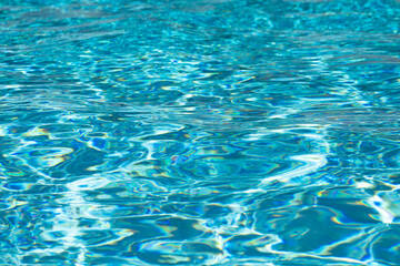 Pool water surface. Water texture. Swimming pool surface. Blue water background. Background of...