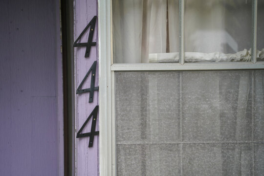 Number 444 on purple wall