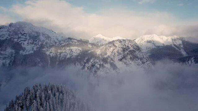 Hazy Mountains in Winter Season Shot by Drone