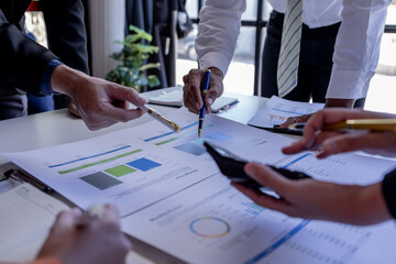 Team Of Business working at the office with documents on desk, planning analyzing the financial...