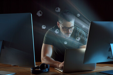 Speed internet. Concentrated man working with laptop at table. Motion blur effect symbolizing fast connection