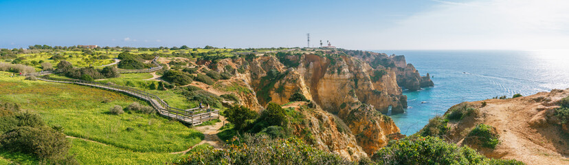 Picturesque cliff walk along the Lagos coastline, Algarve, Portugal. Pano