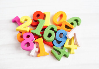 Naklejka premium Number wood block cubes for learning Mathematic, education math concept.