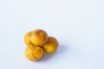 Pile of ripe oranges isolated on white background. Healthy food