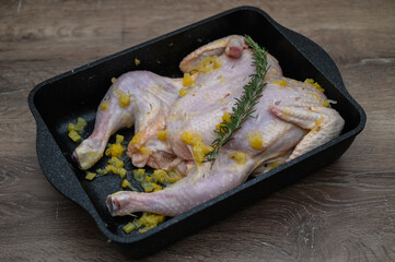 chicken tabaka marinated before cooking in the kitchen 8