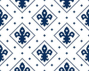 Fleur de lis seamless pattern.Classic royal embroidery vintage style.Traditional and little more modern. Flower with French origins.Vector illustration blue and white background design for decor. © Cozy Wind Design