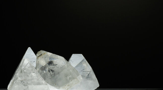Naturally Occurring White and Clear Apophyllite Energy Healing High Vibration Crystal Mineral Pyramid Points Visible Marking Characteristics New Age Art Screen Saver Background Shot with Vintage Lens 