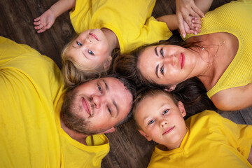 Portrait of a happy family top view