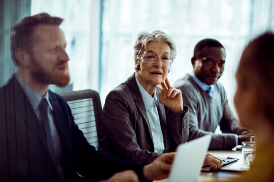 Diverse group of business people having a meeting in a conference room in the office