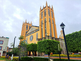 Parish of San Juan Bautista in front of the gardens of the plaza in the center of the magical town...