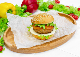 Hamburger, burger on a wooden board
