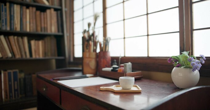 Paper, Japanese study and art document with a desk for creativity for ancient culture and activity. Temae, paint and zen with ink pot, brushes and pencil for traditional and suibokuga drawing