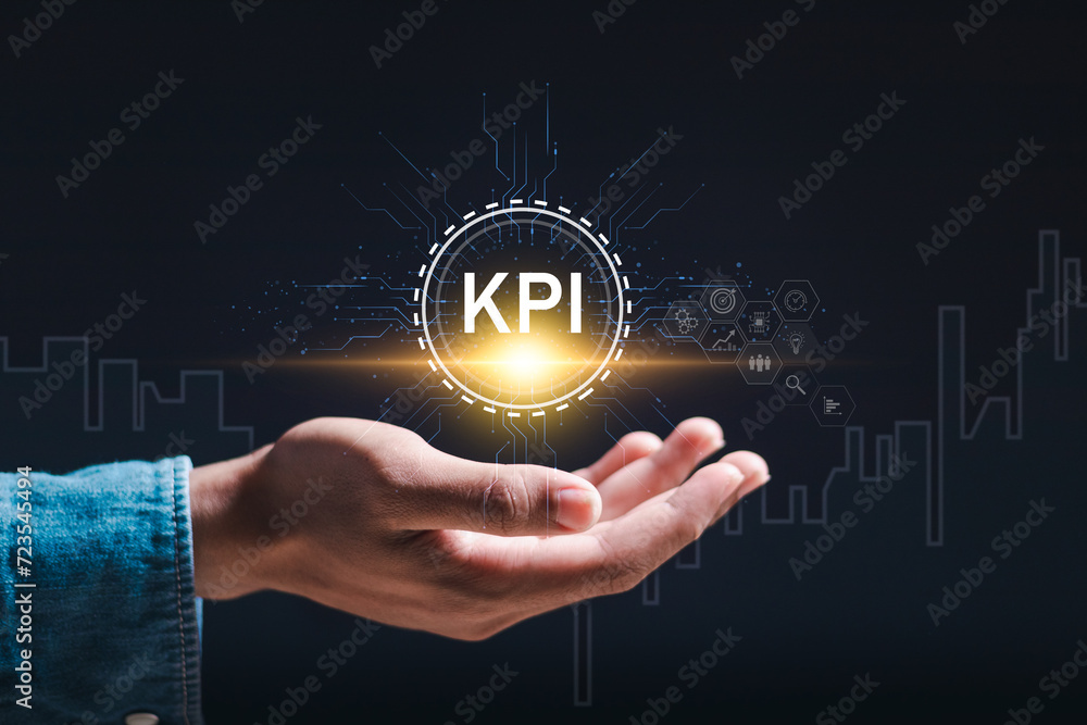 Poster kpi business analytics. businessman holding virtual icon of data analytics report and key performanc