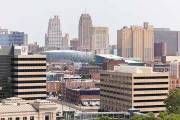 Kansas City, Missouri, USA - June 15, 2023:  Afternoon light shines on historic buildings in...