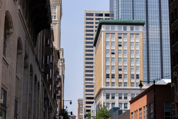 Kansas City, Missouri, USA - June 15, 2023:  Afternoon light shines on historic buildings in downtown Kansas City.
