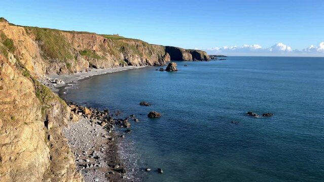Panorama of Tankardstown Bay at full tide deserted beaches and tranquility Copper Coast Waterford Ireland