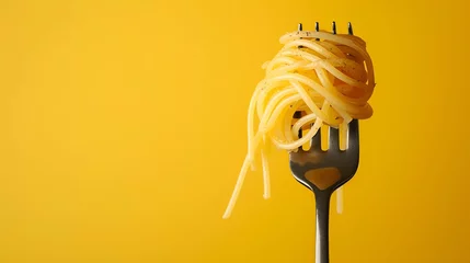 Poster Spaghetti with cheese and black pepper on a fork close-up © Henryz
